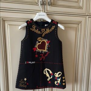 Black Dress with Gold and Red Accents